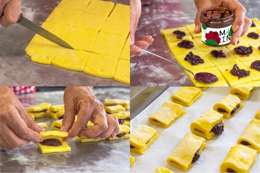 Salčići werden mit Fruchtaufstrich belegt und gefaltet